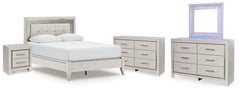 Zyniden Queen Upholstered Panel Bed, 2 Dressers, Mirror and Nightstand