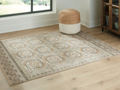 Bachby 5'3" x 7' Area Rug