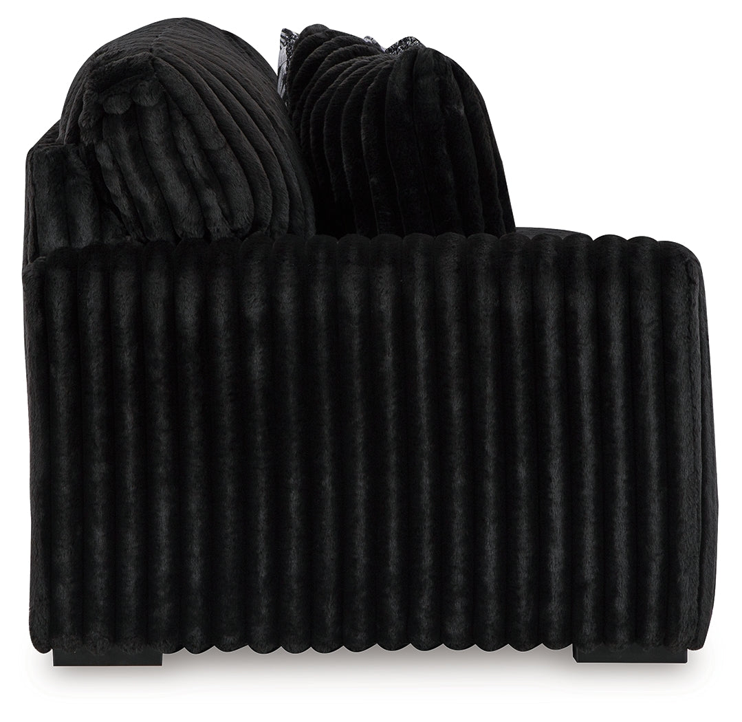 Midnight-Madness 4-Piece Sectional and Oversized Accent Ottoman