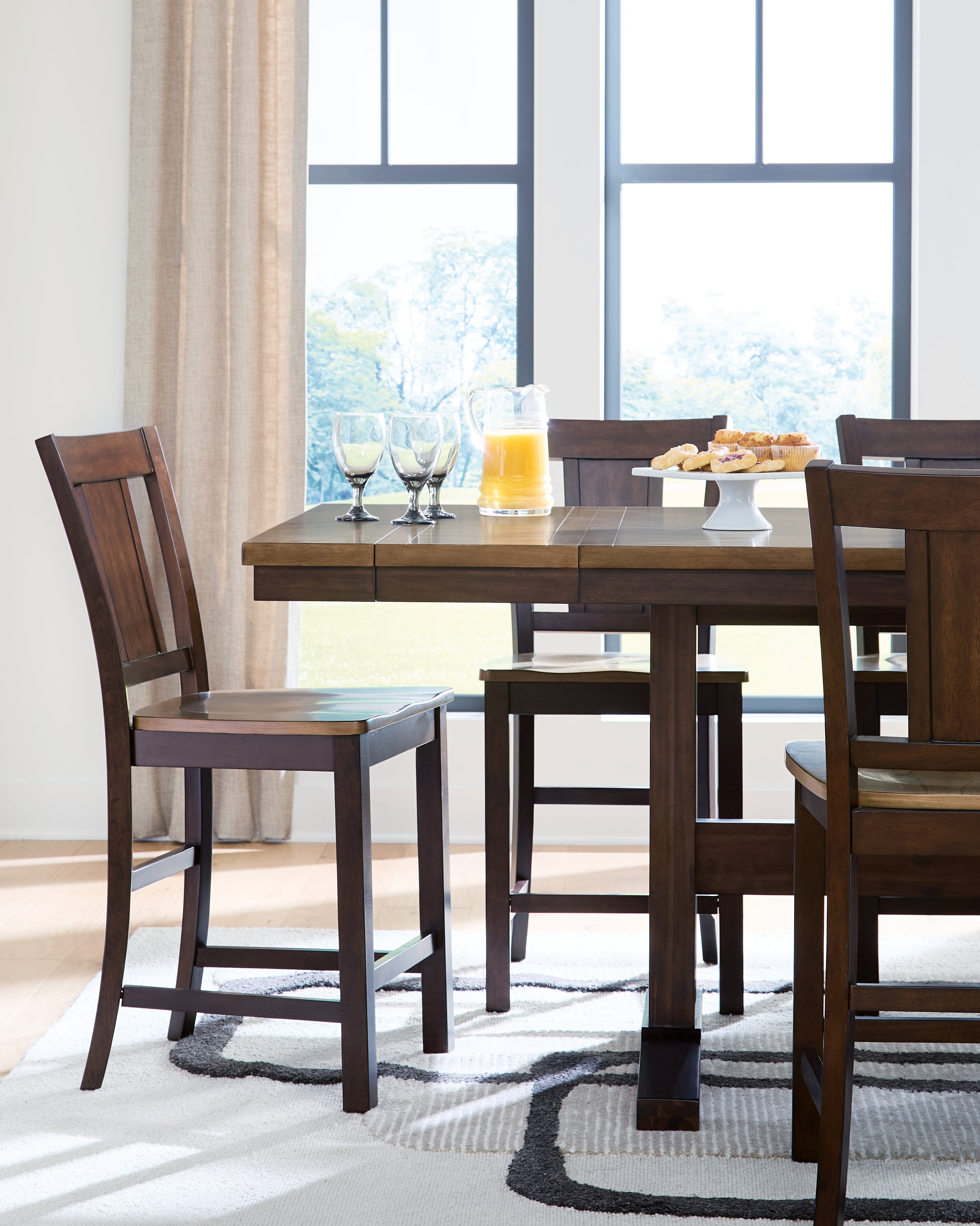 Rylandeen Counter Height Extension Dining Table and 6 Barstools