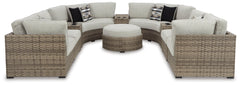 Calworth Outdoor 9-Piece Sectional with Ottoman - MyWaynesHome #